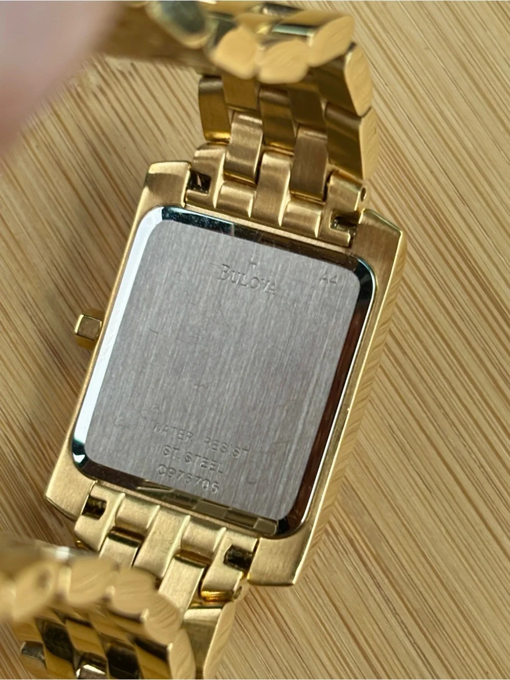 Bulova Gold Tone White Pattern Dial Date Quartz Watch Analog Water Resistant